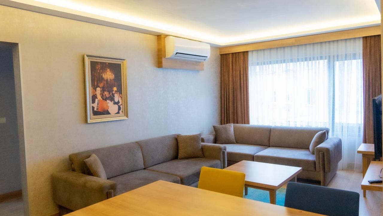 Bursa Suites Apart Otel Esterno foto A living room in a hotel