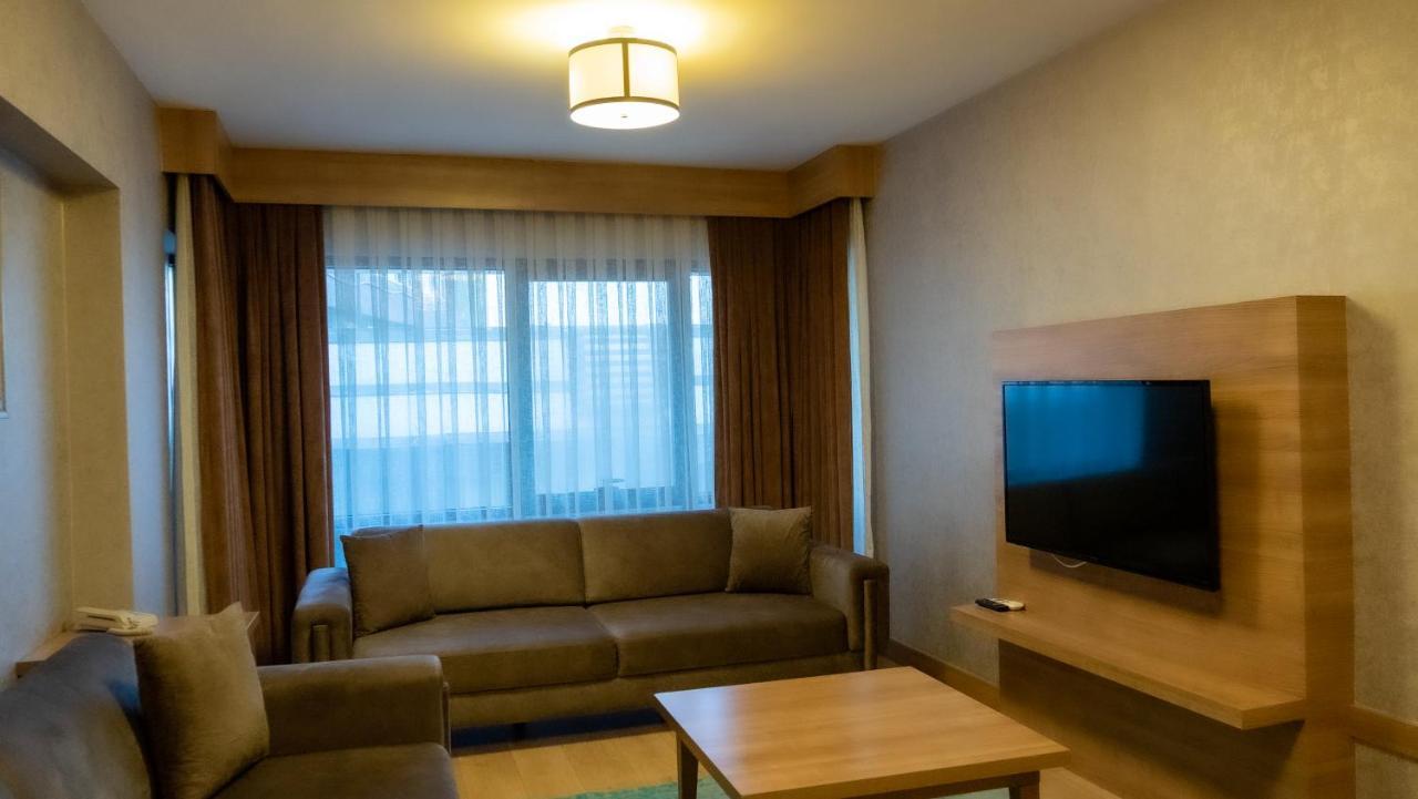 Bursa Suites Apart Otel Esterno foto Living room of a suite at the hotel